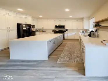 El Segundo Kitchen Remodel Rona Home Remodeling revitalized this El Segundo kitchen into a bright, modern space. We installed white cabinetry with slee