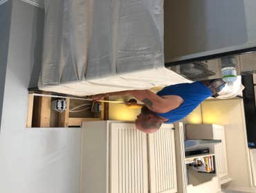 Adam Bryant Remove old back splash, replace with new.