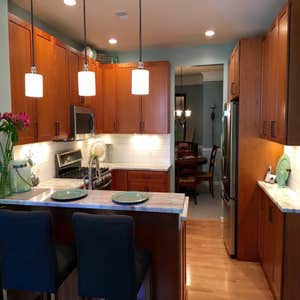 Rockville Kitchen Remodel Our clients asked for more fluidity, so we removed the existing bulkhead, added LED recessed lighting, and moved the...