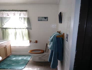 Photos by Oak and Stone Renovations #1 Insurance job. Small electrical fire damaging living room dining room and bath.
