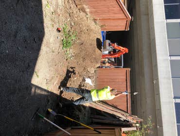 Photos by Dun Rite Remodel LLC #4 Here we installed retaining wall for garden bed and manufactured grass tiles, no lawn mowing here!