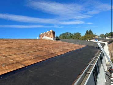 Photos by Pristine Construction #31 Total roof repair of half a twin