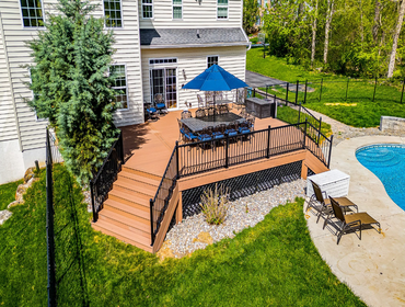Photos by Iron Ridge Contracting LLC #8 New deck construction (approximately 750 sq ft) with design consultation, 3D coordination, and full project exe