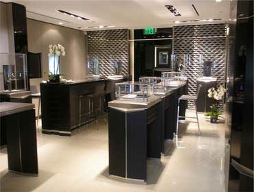 Vertu Project Rodeo Drive, Los Angeles, California Gray limestone floors, metallic wallpaper, custom extruded stainless steel fixtures and decorative g
