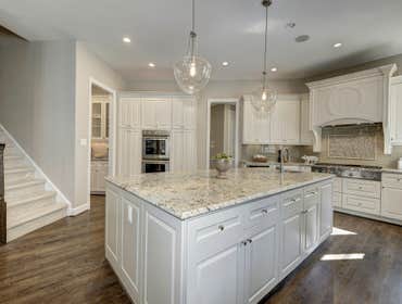 GULICK | CUSTOM Home in McLean The impressive stone and HardiePlank® elevation on our Winthrop really stood out on this corner lot of approximately one
