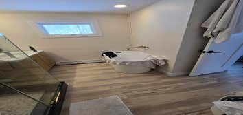 Photos by Kennison Construction LLC #2 Remodeled 1st floor. Demo old bathroom and remodeled it to a master bathroom with a separate powder room