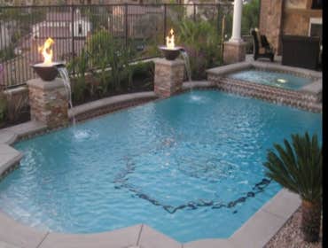 Pool renovation, pergola w/ water-fire feature Pool renovations, pergola w/water-fire feature / infinity edge / spa added / new deck.