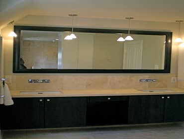 Zen Master Bath Design The remodel of this master bathroom was defined by the client’s request for a rain shower unencumbered by walls. To accomplish 