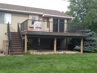 Photos by Custom Home Specialties Inc #2 Timber Tech maintenance free decks with powder coated railings.