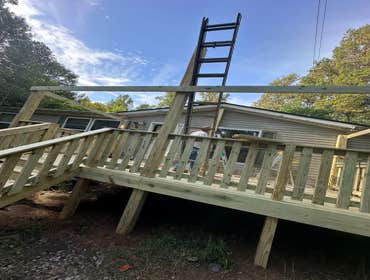 Photos by Peak Resolutions Group #23 Modular Home 16X22 Covered Deck - Asphalt Shingles - 2X4 Pickerts - Steps - Concrete Pad - Ceiling Fan