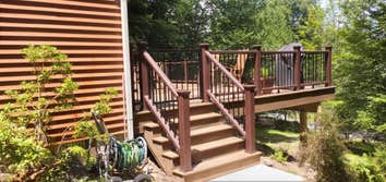 Photos by MiLLCraft Construction Co #1 20 x 30 Trex deck with stair rails and gates