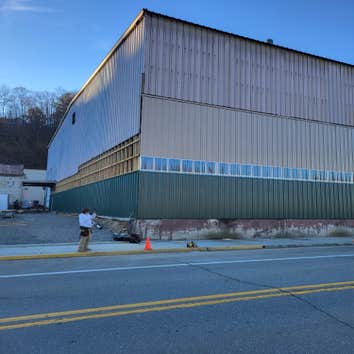 Photos by Nailed It Construction LLC #1 New metal siding on the UFP building in