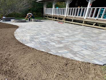 Photos by Steve Danylko Land Service #1 New lawn and landscaping