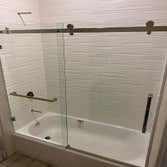 De Anza Remodeling of two bathrooms, new piping, installation of new bathtubs, tiles, LVT Flooring, Vanities, Wall mounted and recessed lighting, new s