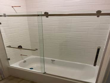 De Anza Remodeling of two bathrooms, new piping, installation of new bathtubs, tiles, LVT Flooring, Vanities, Wall mounted and recessed lighting, new s