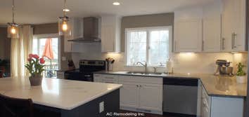 The white and grey kitchen cabinets We opened this kitchen space removing an existing wall, and adding more storage combining two white pantries and gr