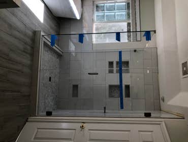 Master bath full remodel Demoed full bathroom. Made shower bigger, added free standing tub, all new floors included custom herringbone insert, mirror w