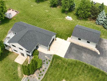 New Glarus roof, soffit, fascia, gutters - May 2025 Full roof replacement on home and garage in New Glarus using CertainTeed Landmark Pro shingles in M