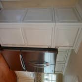 Old golden oak cabinets replaced with new shaker fronts.