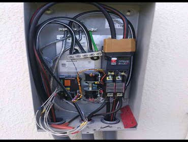 Photos by Gary D Vaughn LLC #1 Before and after pictures electrical and air conditioning installation.
