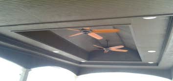 PROJECT FROM ARJONA REMODELING Outdoor palapa includes a chimney made of stone and stucco. The chimney also has a sink on one side and on the other the