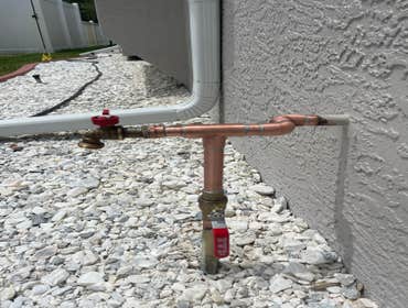 Photos by Next Level Plumbing #1 Replace main house shutoff valve and hose bib spigot.