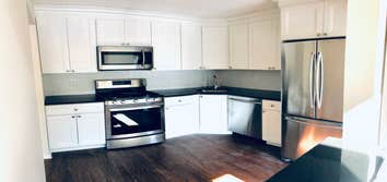 Condo Remodeling Complete remodeling of a 3 bedroom, 2 bathroom condominium. This work was completed in 2021. Kitchen with new cabinets provided by Con