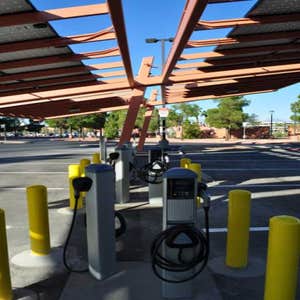 Government Center Photovoltaic 30kW photovoltaic-covering parking shade structure. Installation includes electric vehicle charging stations. ...