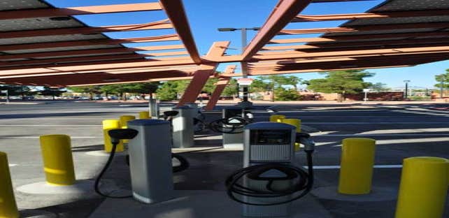 Government Center Photovoltaic 30kW photovoltaic-covering parking shade structure. Installation includes electric vehicle charging stations. Contracto