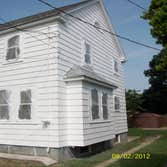 Brilliant Painting, LLC Exterior Project 1 Before and after photos of a full house that has been power washed, scraped, hand sanded, primed, and painte