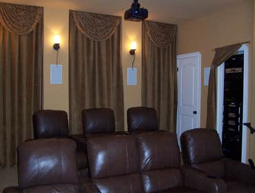 Various photos of a couple of the many professional installations Connected Technology has done. From full-blown home theaters to music, lighting contr