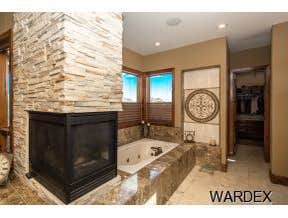 Photos by Sequoia Homes LLC #1 This Tuscan/Mediterranean style home is truly one of Mohave County's finest luxury homes. Over 1 acre of property in the