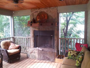 screen porch with fire place