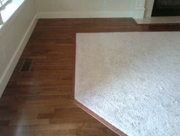 Engineered Wood FLoor with Carpet Inlay Tricky to do but came out great
