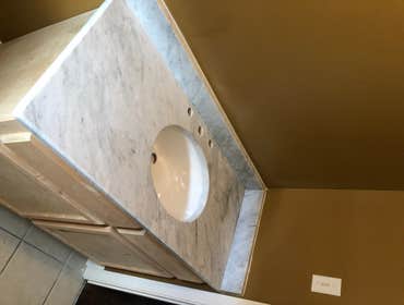 Bathroom overhaul Custom vanities
Master bathroom 2 cm Calcutta quartz
Single vanity 3 cm Carrera marble