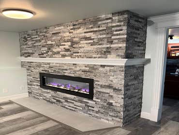 Photos by Interior Decoration Renovation LLC #5 Renovation of a fireplace, we replaced the drywall and all the preparation, installed the stones, and f