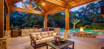 The Taylor The patio cover provides enough protected outdoor space for the hosts and their guests. The outdoor couch and accent table were hand-selecte