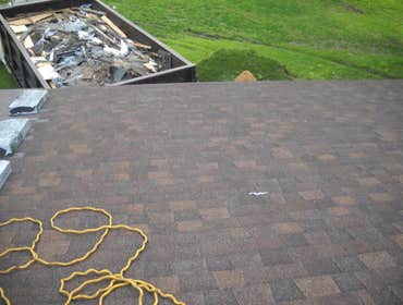 Tree fell completed roof