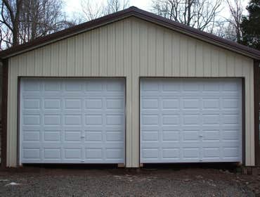 Cheap Pole Barn Special : The Gemini Building Dimensions : 24'W x 36'L x 10'H ( Garage )
<a href="http://cheappolebarn.com/garages-special-the-gemini/