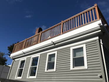 Provincetown Deck We did costume widows walk deck out of PT sleepers azek gray deck boards and mahogany railings
The different with this one was tha