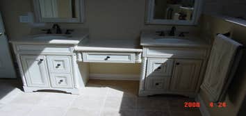 Bathroom Renovation This bathroom is entirely comprised of natural stone on the floor and shower walls. We designed and sold all the products for this 