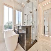 Primary Baths Primary Bath renovations start at $30,000. We focus on quality fixtures, beautiful and durable materials, and fantastic lighting.