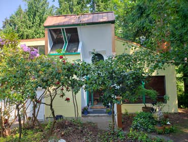 Exterior Hardy siding, painting ,plus new metal roof