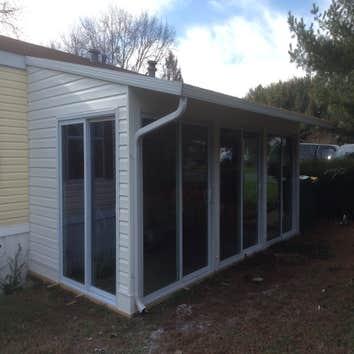Photo(s) from Joe Hannock Custom Carpentry First is a glassed in room. The roof was existing. I framed the room, installed the doors, and trimmed the e