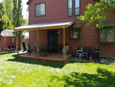 Awning, new shed, and mulch Awning, new shed, and mulch