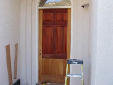 Chris Matthews Painting Project Exterior painting of two-story home and exterior wall fence, staining of deck, stairways and doors. San Diego, CA