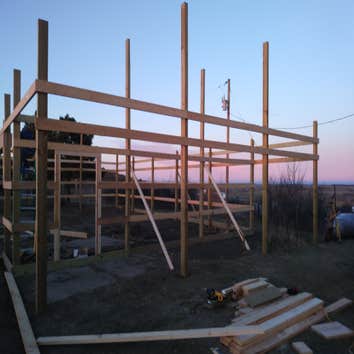 Pole Barn/Garage Project 54'X30' Pole barn/garage (Work in progress)
2 garage doors
1 open car port
1 window
1 door
Propane heated
Spray foam in