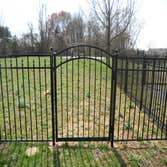 Sentinal black aluminum in Malvern This is a beautiful 54 inch black aluminum fence with swing out self closing estate gates with magnetic latches. Al