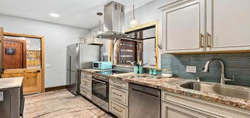 Our kitchenette features a patio window for entertaining!
