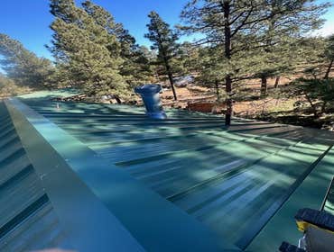 Photos by Northern Arizona Building and Investments #3 Tear off clay tile roof, install 24 Guage standing seam